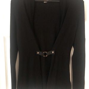 Michael Kohrs lightweight sweater w leather belt.